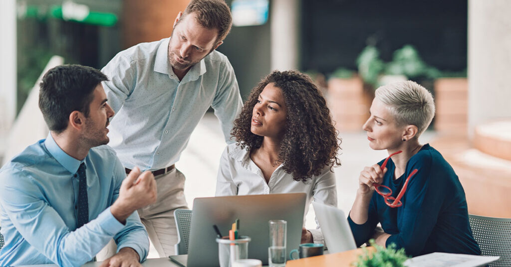 Multi-ethnic group of entrepreneurs discussing business